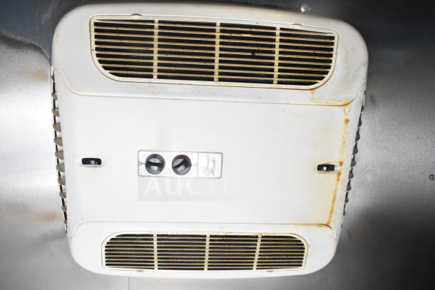 Ceiling-mounted air conditioning vent in used condition inside 2021 Diamond Cargo food trailer. Controls visible.