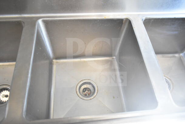 Stainless steel triple sink inside 2021 Diamond Cargo 8.5'x24' food trailer, includes CaptiveAire grease hood.