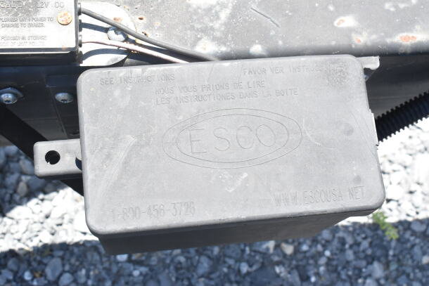ESCo electrical box on 2021 Diamond Cargo food trailer chassis with visible wiring and metal surface detail.
