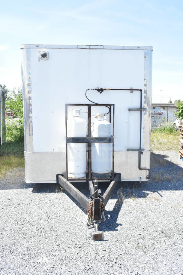 2021 Diamond Cargo 8.5'x24' food trailer with propane tanks. Features include CaptiveAire grease hood, Turbochef ovens.