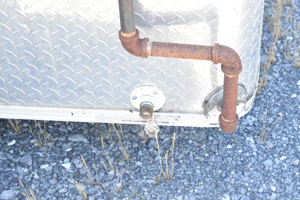 Rusty exterior pipe detail on 2021 Diamond Cargo 8.5'x24' food trailer. Diamond plate surface visible.