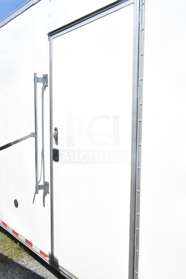 2021 Diamond Cargo 8.5'x24' food trailer, white exterior, CaptiveAire grease hood, Turbochef ovens, refrigeration.