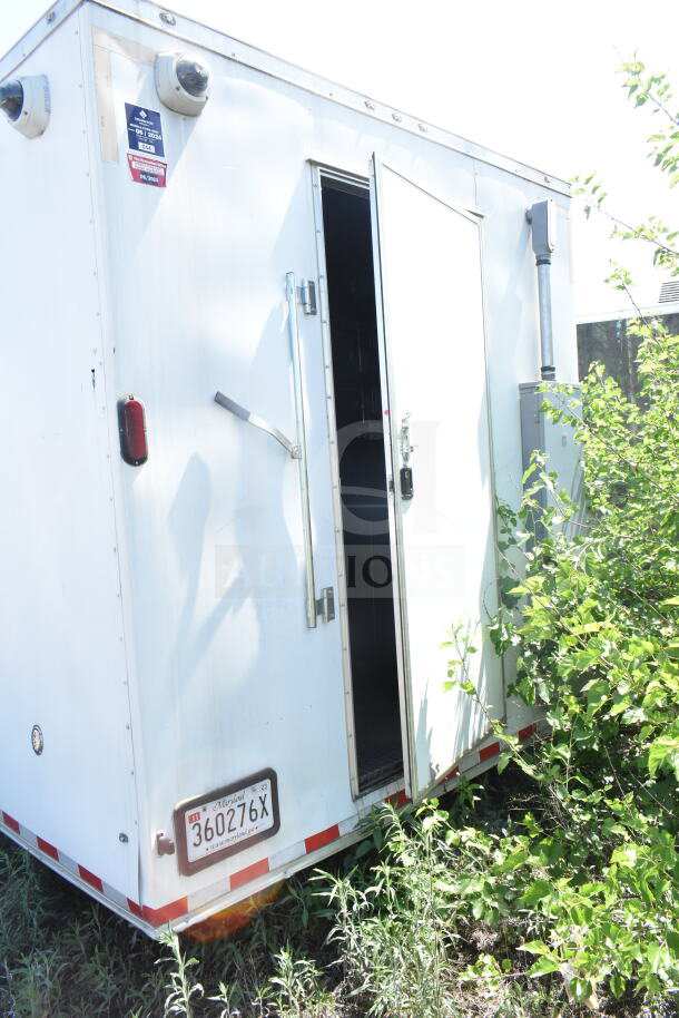 2021 Diamond Cargo 8.5'x24' food trailer with CaptiveAire grease hood. Visible tag: Maryland license plate 360276X.