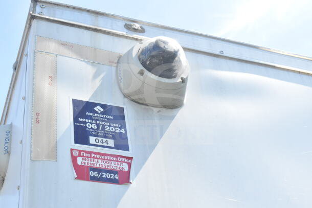 2021 Diamond Cargo 8.5'x24' food trailer with security camera and permit stickers for Arlington, Virginia, expiring 06/2024.