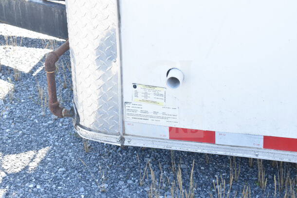 2021 Diamond Cargo 8.5'x24' food trailer, visible VIN: 53NBE2429M1089847, diamond plating, and external pipe.