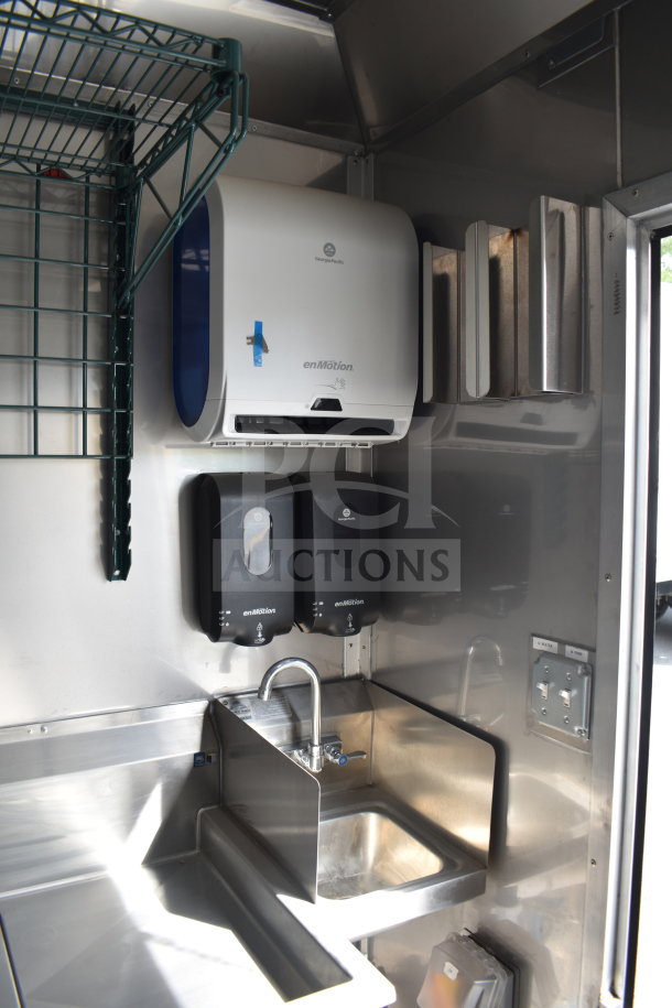 2021 Texino cooking trailer sink area with Georgia-Pacific enMotion paper towel and soap dispensers, stainless steel finish.