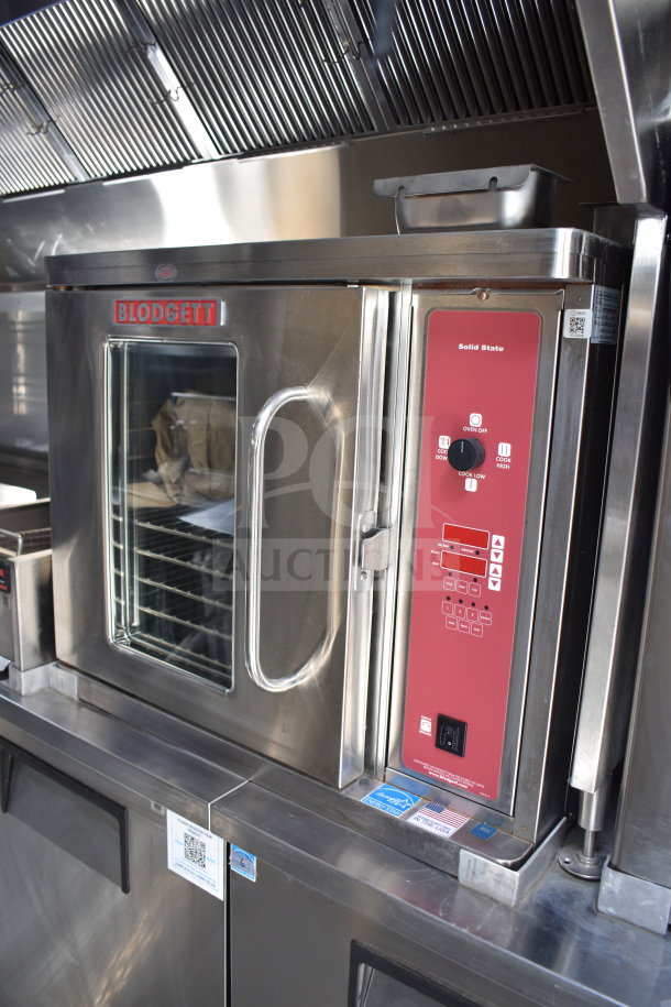 2021 Texino 28ft cooking trailer with Blodgett oven, Ultrafryer Ultrastat23 fryer, CaptiveAire hood, and True refrigeration.