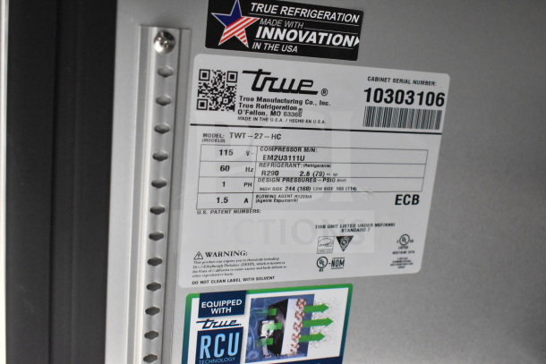Label on True Refrigeration unit showing model TWT-27-HC, serial number 10303106, made in the USA.