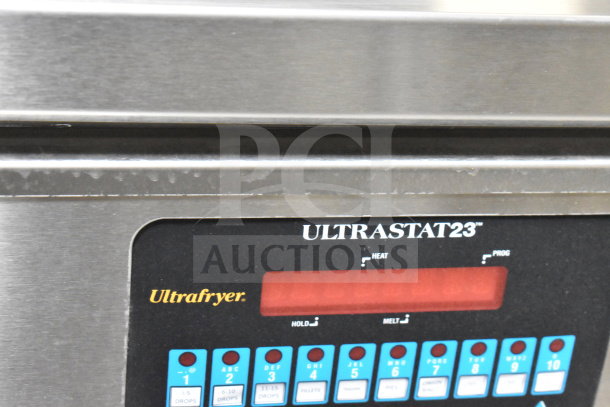 Ultrafryer Ultrastat23 control panel on the 2021 Texino cooking trailer, featuring adjustable settings and digital display.