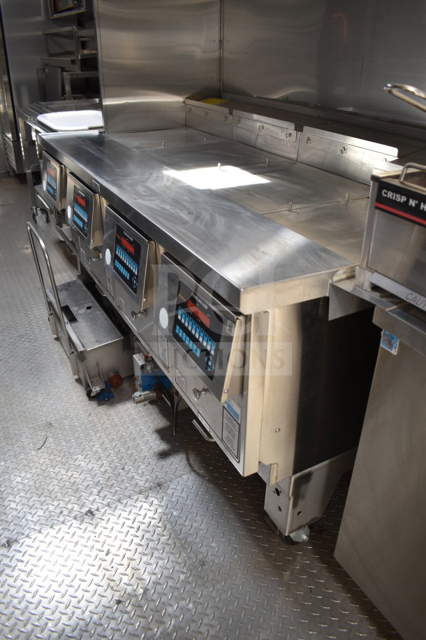 2021 Texino 28ft cooking trailer interior with Ultrafryer Ultrastat23 4-bay fryer, stainless steel finish, tested and working.