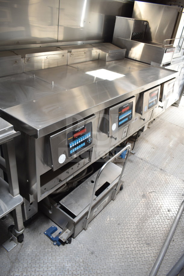 New 2021 Texino 28ft Popeyes-configured cooking trailer with Ultrafryer Ultrastat23 4-bay fryer, CaptiveAire hood, and full 2021 True refrigeration suite.