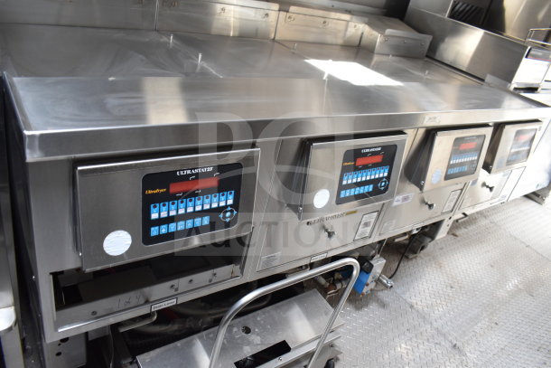 Texino 2021 cooking trailer's Ultrastat23 4-bay fryer. Features digital controls and stainless steel construction.