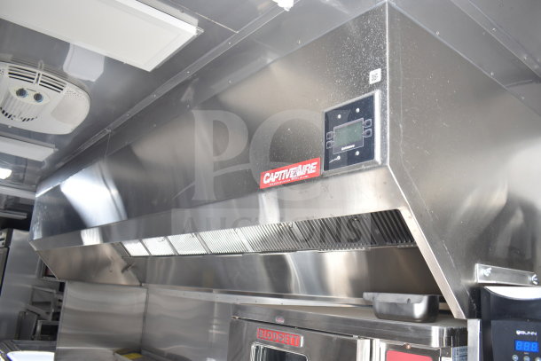NEW 2021 Texino 28ft cooking trailer interior; features CaptiveAire hood. Stainless steel finish in excellent condition.