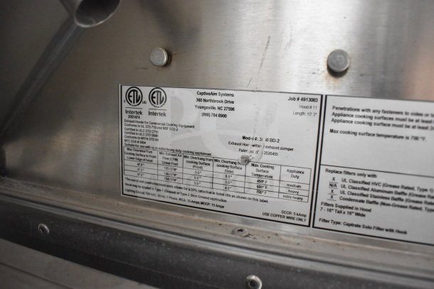 Label on CaptiveAire hood in Texino 28ft cooking trailer. Lists certifications, airflow data, and installation guidelines.