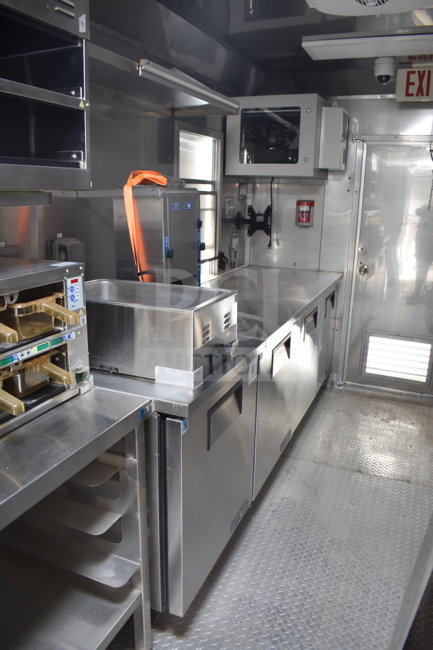 2021 Texino 28ft triple-axle cooking trailer: Ultrastat23 fryer, CaptiveAire hood, 2021 True refrigeration, Winston CVap.