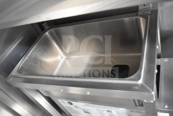 2021 Texino cooking trailer's stainless steel fryer bay, part of the Ultrafryer Ultrastat23 system.