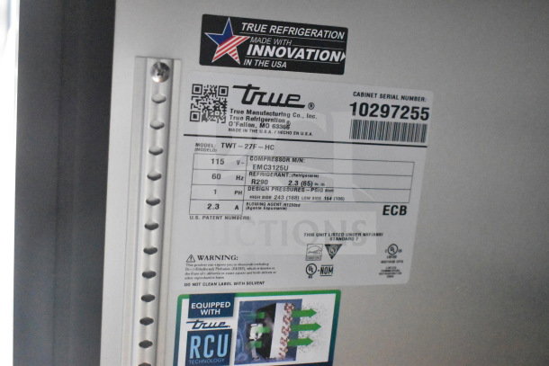 Label on True Refrigeration unit, model TWT-27F-HC, showing specifications, serial number 10297255, and warning details.