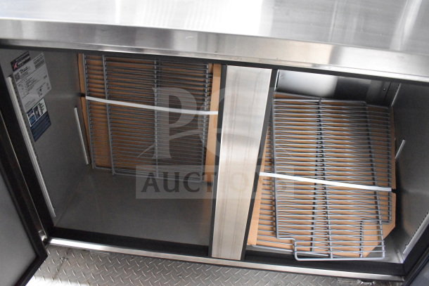 Texino 2021 trailer interior showing True Refrigeration racks and storage space. Stainless steel finish, new condition.