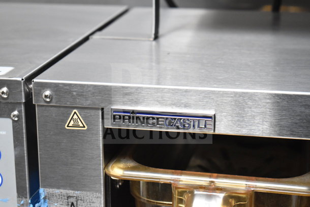 Close-up of Prince Castle appliance in 2021 Texino 28ft Triple-Axle Cooking Trailer, showcasing stainless steel finish and branding.