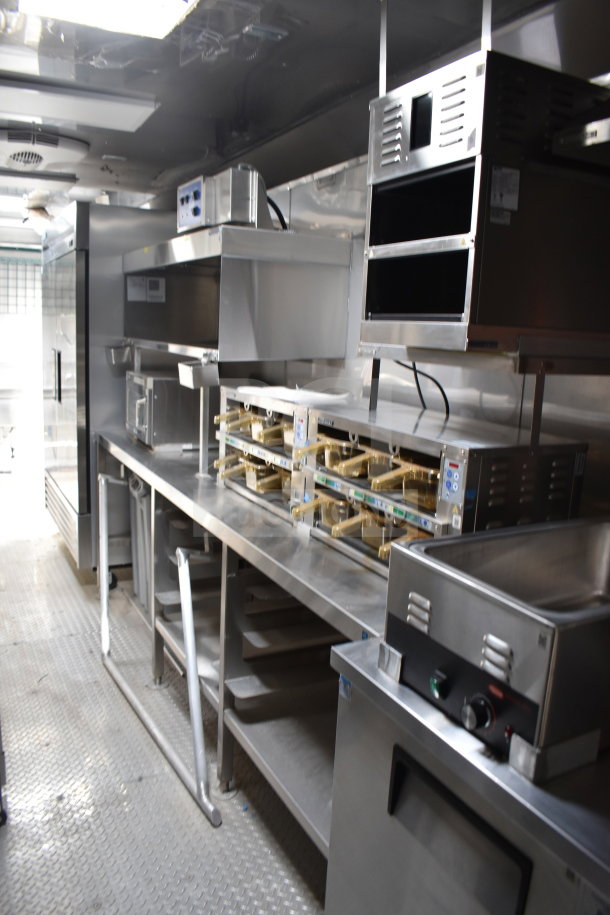 2021 Texino 28ft cooking trailer, featuring Ultrafryer Ultrastat23, CaptiveAire hood, True refrigeration, Winston CVap.
