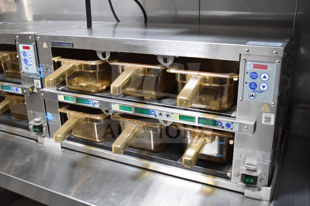 Texino cooking trailer's 4-bay Ultrafryer Ultrastat23 in stainless steel with digital controls, new condition.