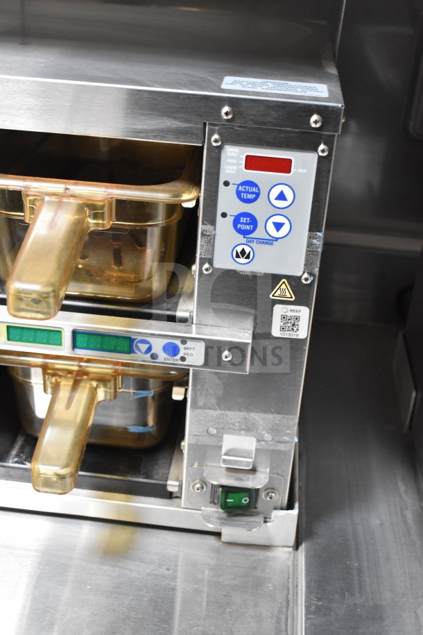 Ultrafryer Ultrastat23 4-Bay Fryer with controls in Texino Cooking Trailer, showcasing fryer compartments and control panel.