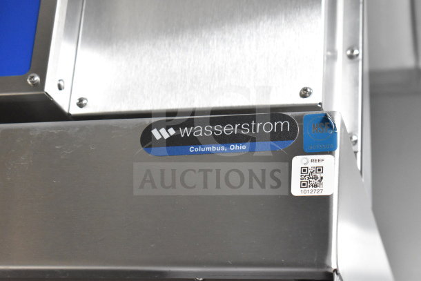 "2021 Texino 28ft Cooking Trailer with Ultrafryer Ultrastat23, CaptiveAire Hood. Wasserstrom label visible."