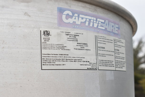 CaptiveAire Systems label on Texino cooking trailer, detailing exhaust motor specs: 0.750 HP, 208 VAC, 60 Hz, 3 phase.