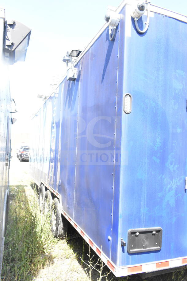 Blue Rock Solid Cargo 8.5'x28' food trailer shell with CaptiveAire grease hood, ready for customization.