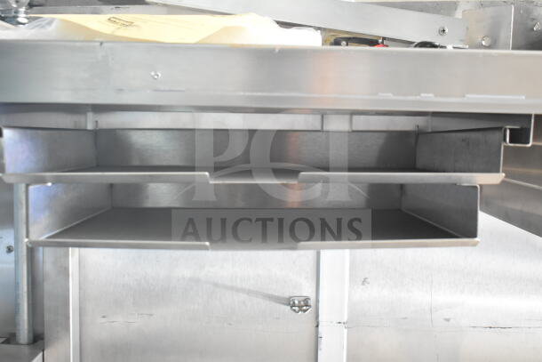 Rock Solid Cargo 8.5'x28' food trailer shell with CaptiveAire grease hood, ready for outfitting, VIN: 7H2BE2837ND041749.