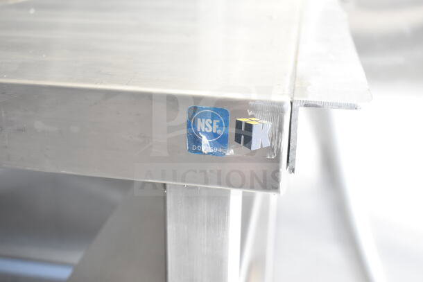 NSF certification label on a stainless steel surface of the Rock Solid Cargo food trailer.