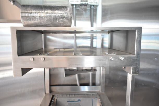 Rock Solid Cargo 8.5'x28' food trailer shell interior, featuring CaptiveAire grease hood. Ready for custom equipment installation.