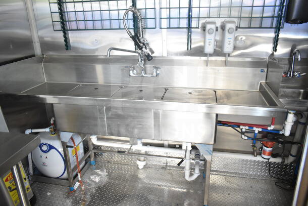 Rock Solid Cargo 8.5'x28' food trailer shell with CaptiveAire grease hood, stainless steel sink, and plumbing setup shown.