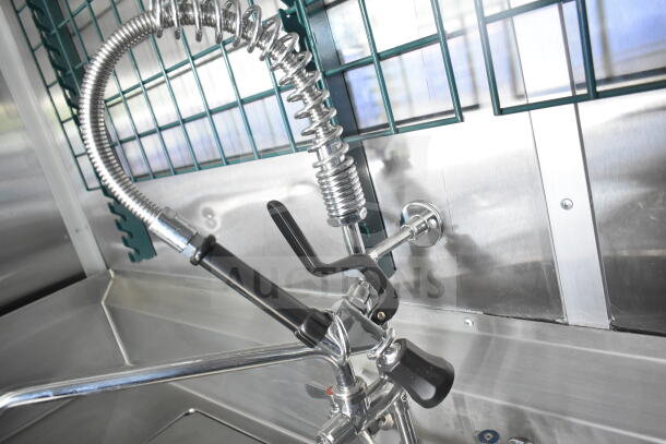 Rock Solid Cargo 8.5'x28' food trailer shell interior, showcasing a shiny steel sink with a flexible spring faucet.
