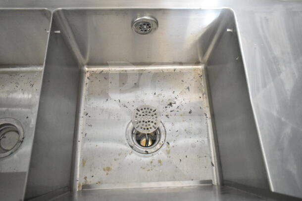 Stainless steel sink in Rock Solid Cargo 8.5'x28' food trailer shell, ready for customization with CaptiveAire grease hood.
