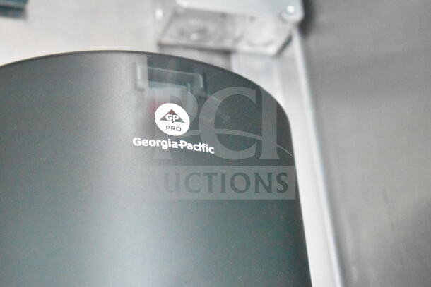 Georgia-Pacific Pro paper towel dispenser inside Rock Solid Cargo food trailer with CaptiveAire grease hood.