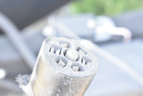 Close-up of a component or connector from a Rock Solid Cargo 8.5'x28' food trailer shell. Further inspection needed for details.