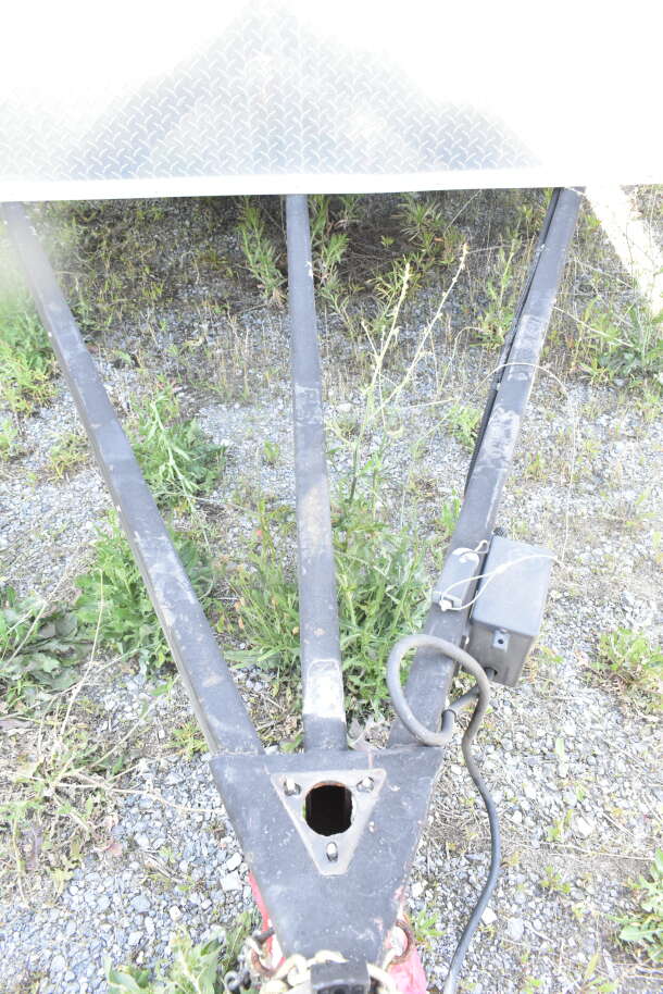 Rock Solid Cargo food trailer shell hitch detail, ready for restaurant equipment. Features CaptiveAire grease hood.