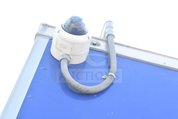 Rock Solid Cargo food trailer shell, blue exterior, equipped with CaptiveAire grease hood. Ready for custom outfitting.