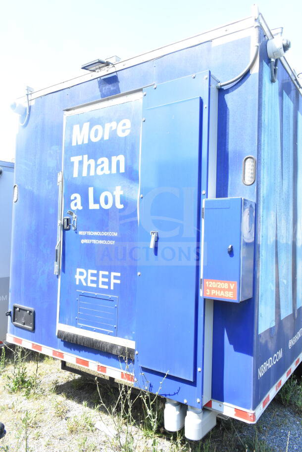 Rock Solid Cargo 8.5'x28' food trailer shell, blue exterior. Features CaptiveAire grease hood, ready for custom outfitting.