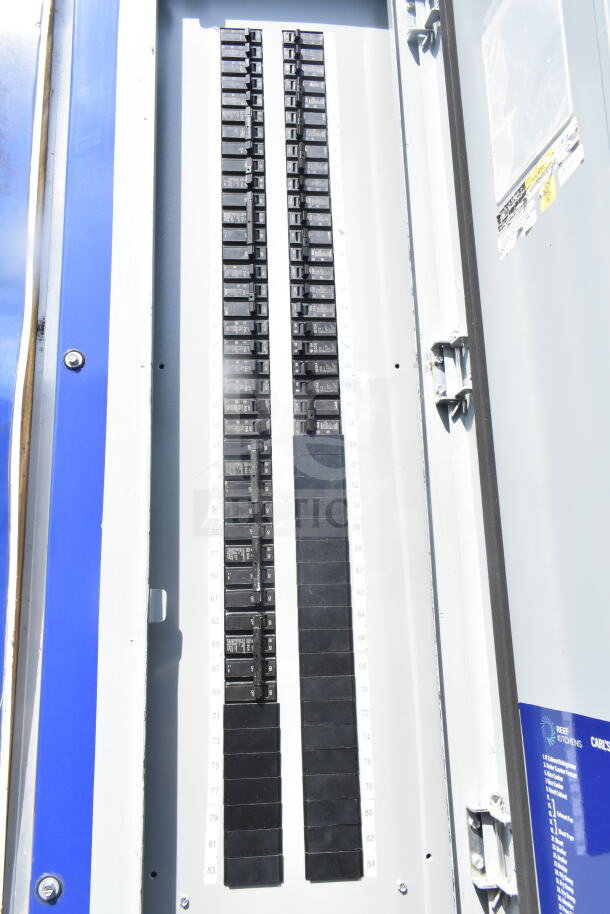 Inside view of electrical panel in Rock Solid Cargo 8.5'x28' food trailer shell, ready for equipment installation.