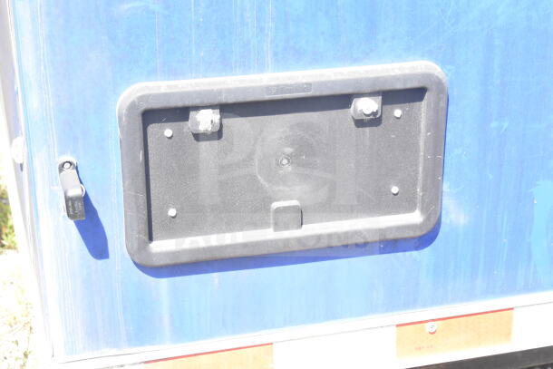 Rock Solid Cargo food trailer shell, blue exterior, with CaptiveAire grease hood. Ready for customization. VIN: 7H2BE2837ND041749.