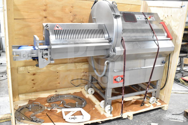Treif Puma horizontal slicer, commercial casters, stainless steel, excellent condition, includes parts and safety labels.