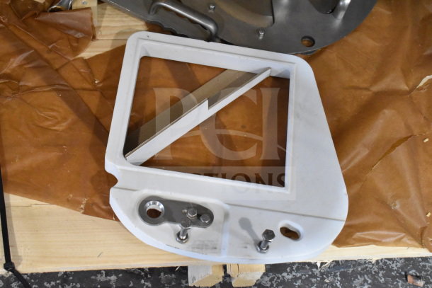 Treif Puma Horizontal Slicer component, featuring a metal blade in a plastic housing. Appears in good condition.