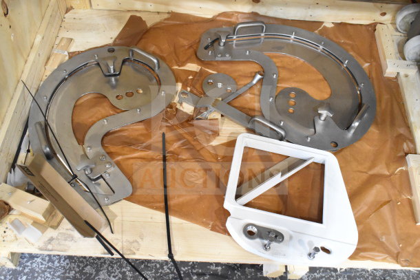 Treif Puma Horizontal Slicer components on commercial casters in good condition, made of stainless steel, with mounting hardware.
