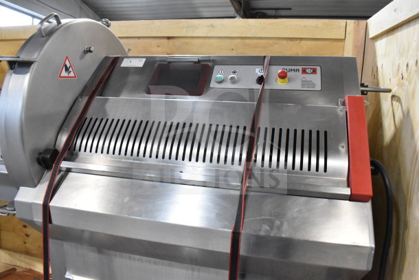 Treif Puma horizontal slicer/portion cutter on commercial casters, stainless steel, control panel, excellent condition.