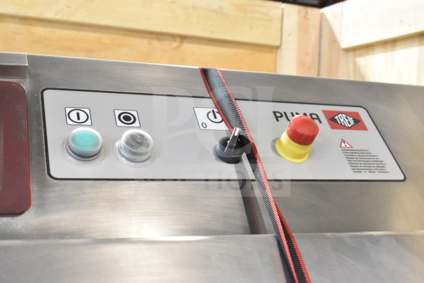 Treif Puma Horizontal Slicer control panel with buttons and emergency stop, stainless steel finish, model branding visible.