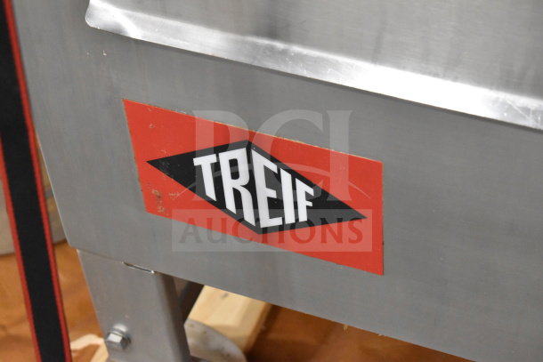 Treif Puma Horizontal Slicer in stainless steel, mounted on commercial casters. Visible red Treif logo on the side.
