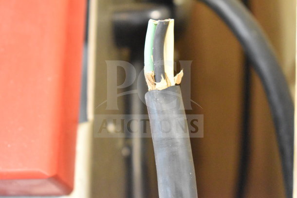 Damaged electrical cable for Treif Puma Horizontal Slicer, showing exposed wires. Caution advised for potential buyers.