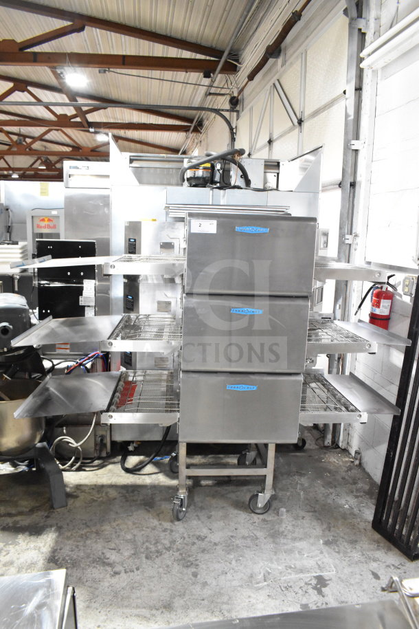 Turbochef HCW2620 conveyor rapid cook oven on casters, electric, 208/240V, 3-phase. Appears in good condition.